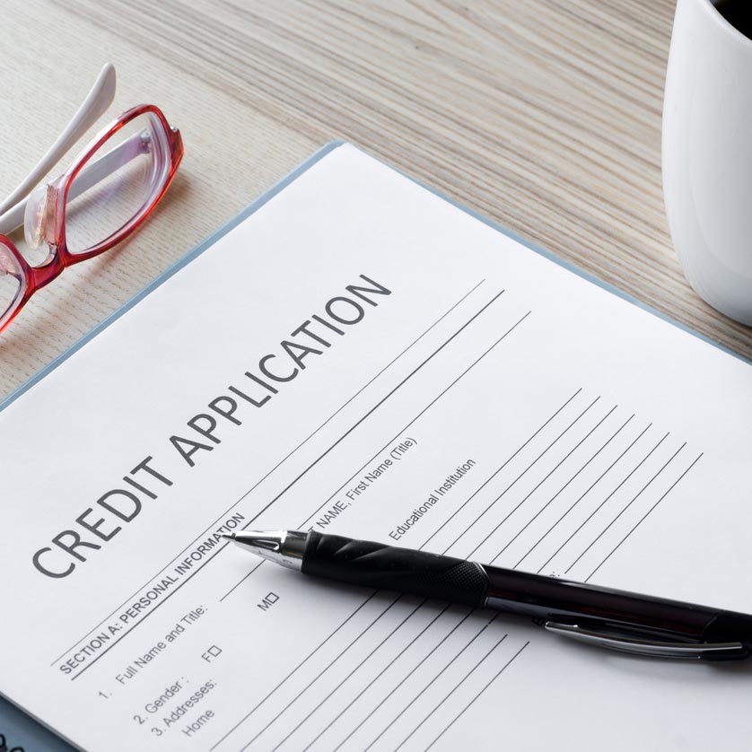 Man signing credit application